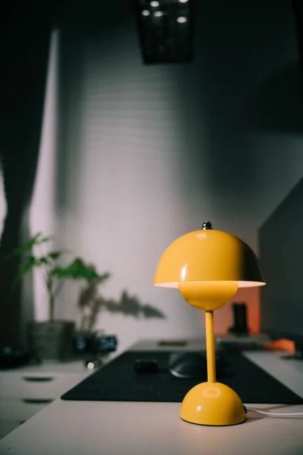 A refined office desk arrangement showcasing Apple devices: iMac, MacBook, and iPad.