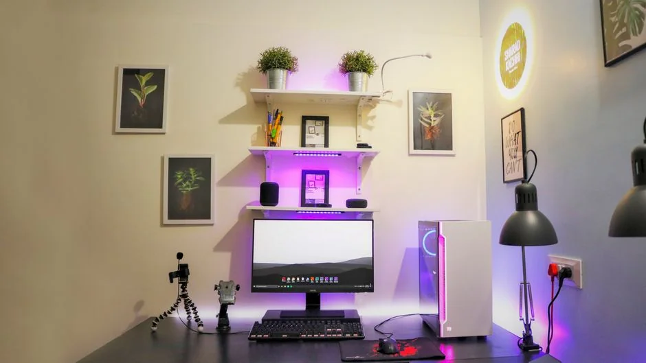 A sleek office setup with two computer monitors showing web design work, highlighting technology and productivity.